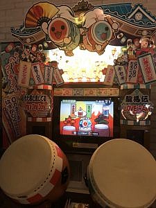 A Japanese taiko-drumming arcade game cabinet.