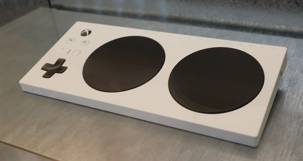 Picture of Xbox Adaptive Controller laying on the table.