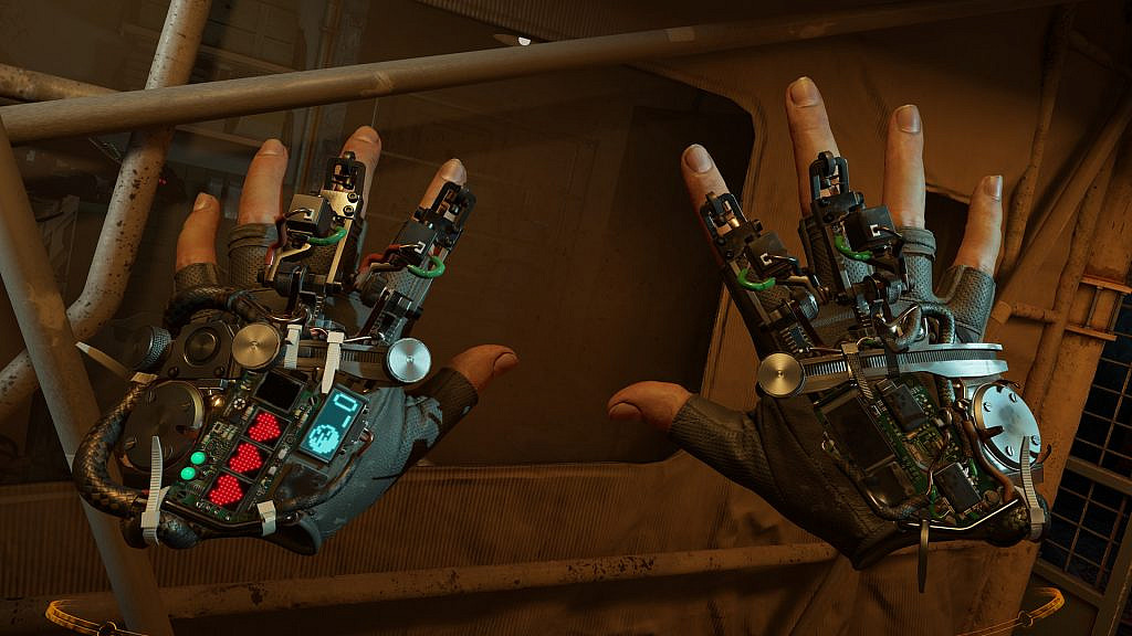 Two floating hands with gloves that have lots of details on them. There are wires, tiny screens and other electrical components.