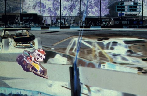 Picture of a race track with a badly cropped image of apanda on a go-kart