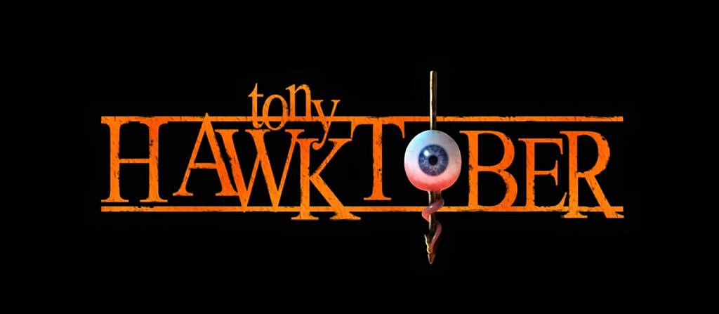 The orange logo of a Hawktober on a black background with an eyeball replacing the letter “O”.