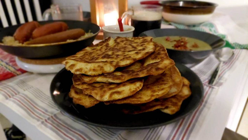 Pile of flatbreads on a plate.