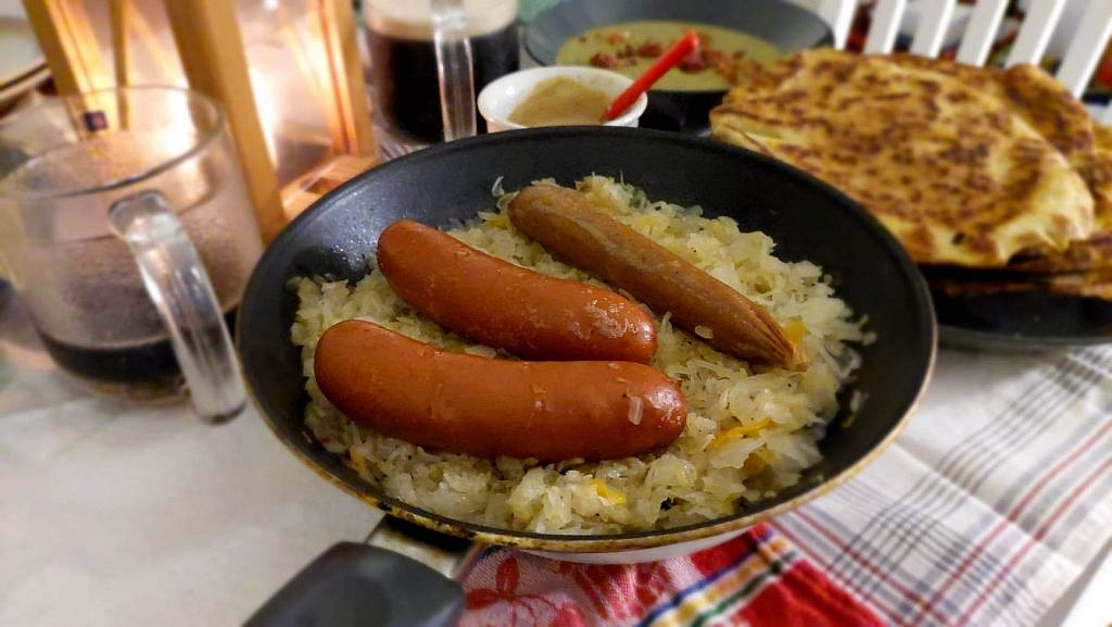 Sausages and sauerkraut are on display.