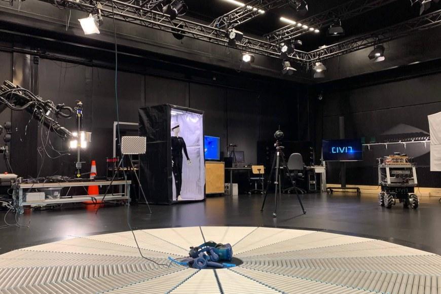 Laboratory of immersive technologies showing virtual reality glasses and virtual reality treadmill, cameras and camera platforms