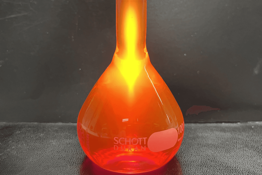 Bottle filled with orange liquid