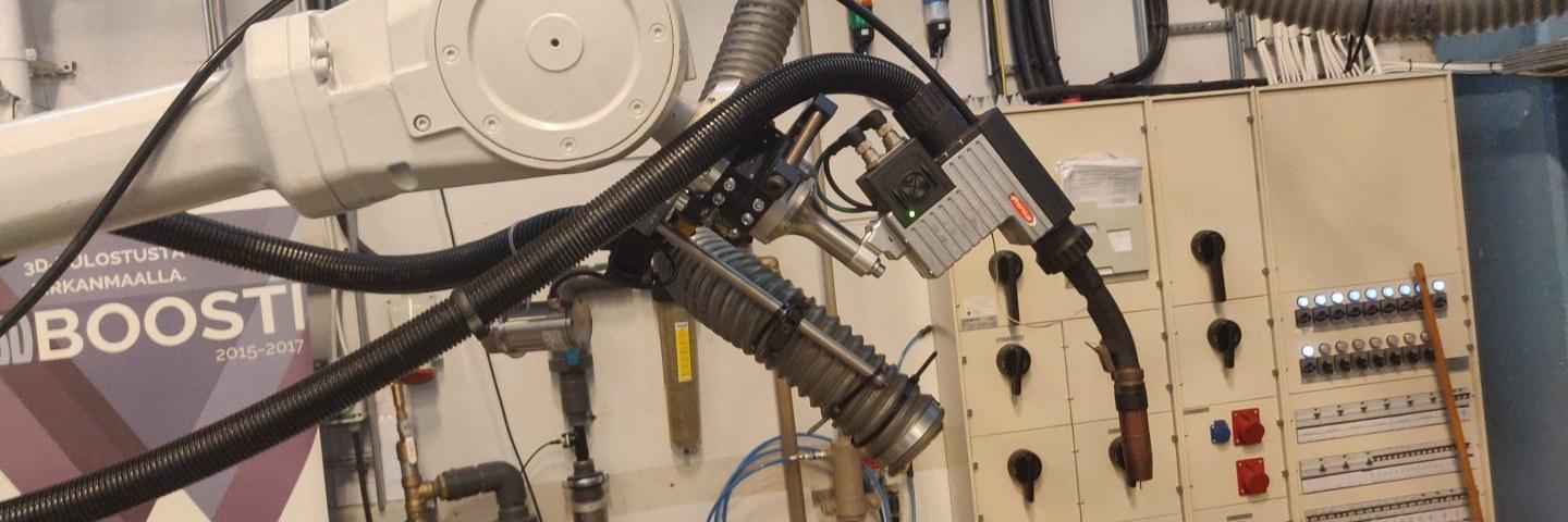 Wire Arc Additive Manufacturing: welding torch mounted on ABB robot