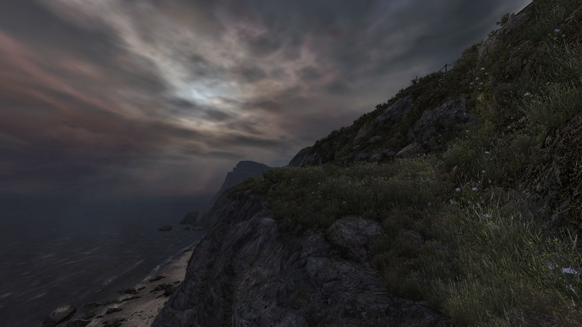 Looking out at where the cliffside meets the sea at dusk, ominous clouds in overhead. From the game Dear Esther.