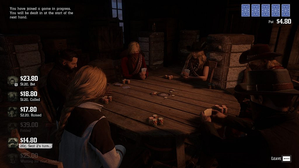 Six people dressed like cowboys of the wild west. They are playing poker at a table, with many cards and chips around.