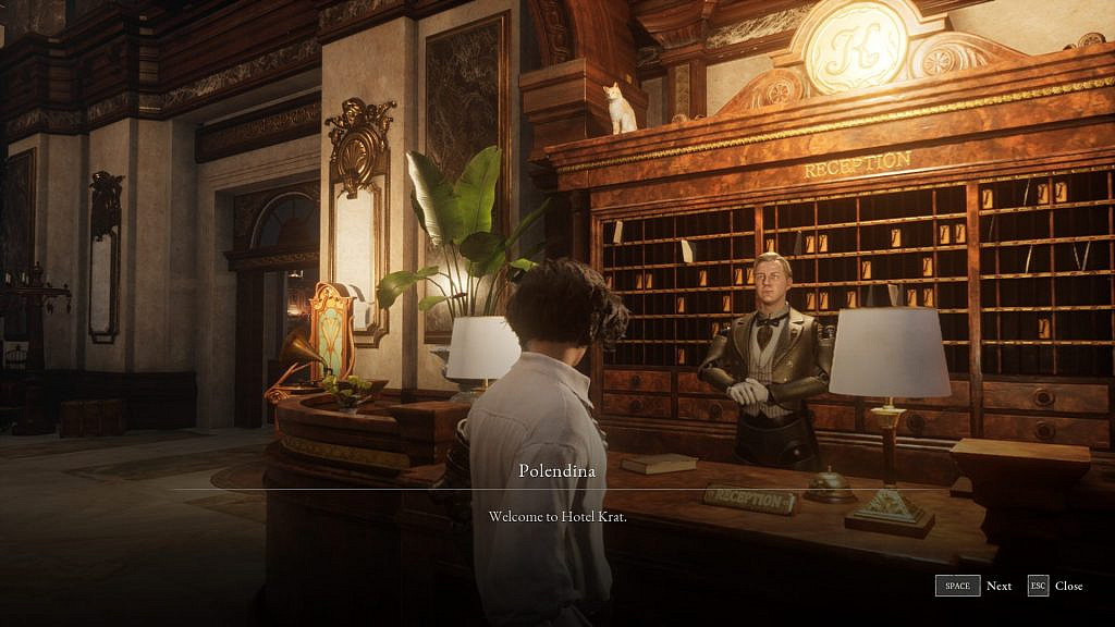 A man standing at a counter in a warmly lit building being served by a robotic puppet. The puppet, named Polendina, says: "Welcome to Hotel Krat."