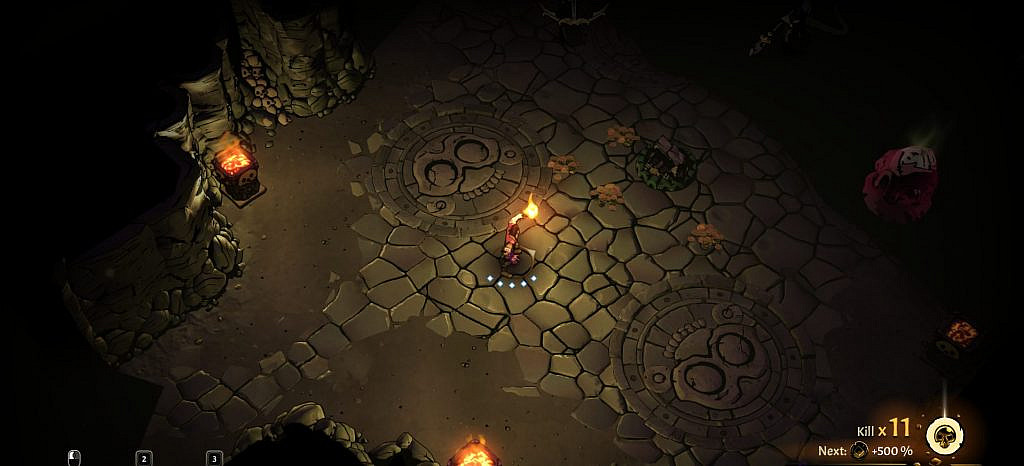 Main character in dimly lit cavern holding a torch