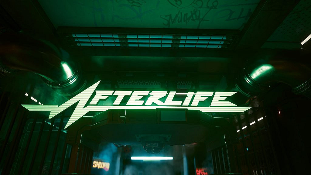 "Afterlife" written on top of the entrance door, surveillance cameras can be seen around.