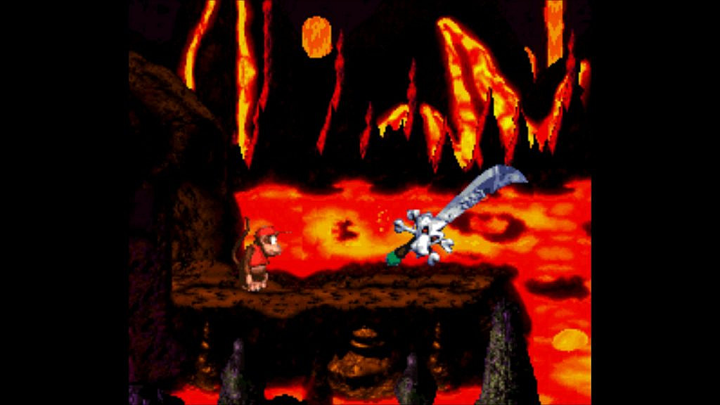 Monkey and sword on a ledge with lava in the background