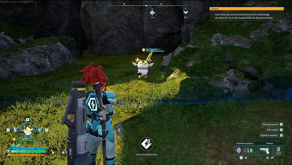 The player character is seen from the back, looking at a pal called Sparkit