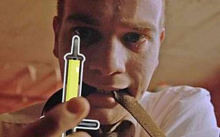 A scene from the hit movie "Trainspotting" where Ewan McGregor holds up a heroin needle. Here, the needle has been replaced with the item "soldier's syringe" (attack speed up).