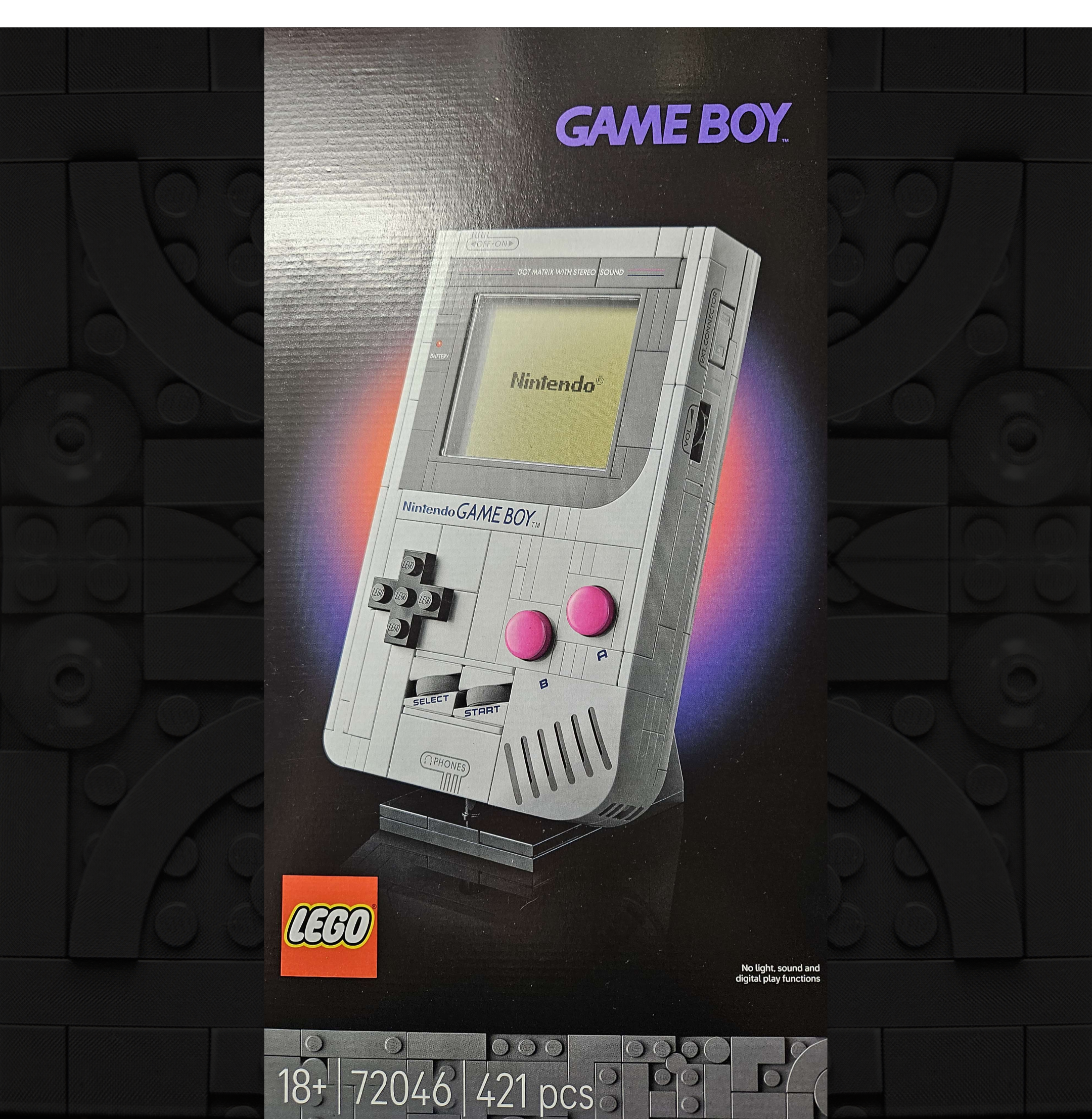 A photo of the Game Boy LEGO set packaging with the console in the center and a glowing background