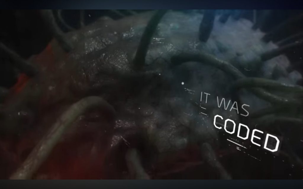 Screenshot from the Division. Weird virus thing, with text saying "IT WAS CODED" prominently displayed